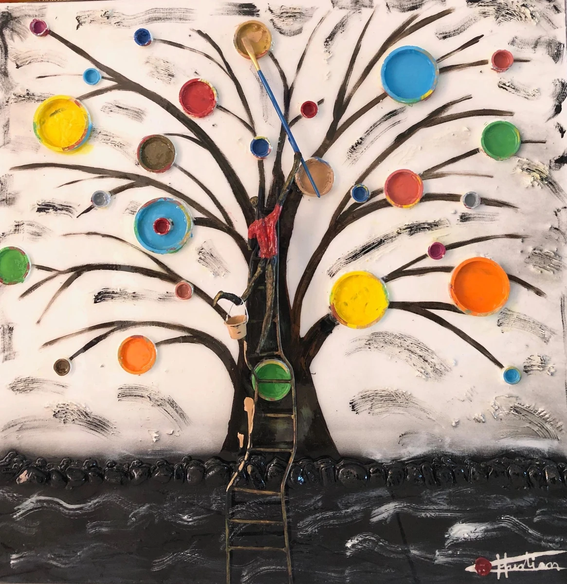 "Black Tree of Life," 36 x 36 inch mixed-media painting in resin, a bare black tree hung with bright paint-pot discs and a sculpted figure climbing a ladder up the trunk