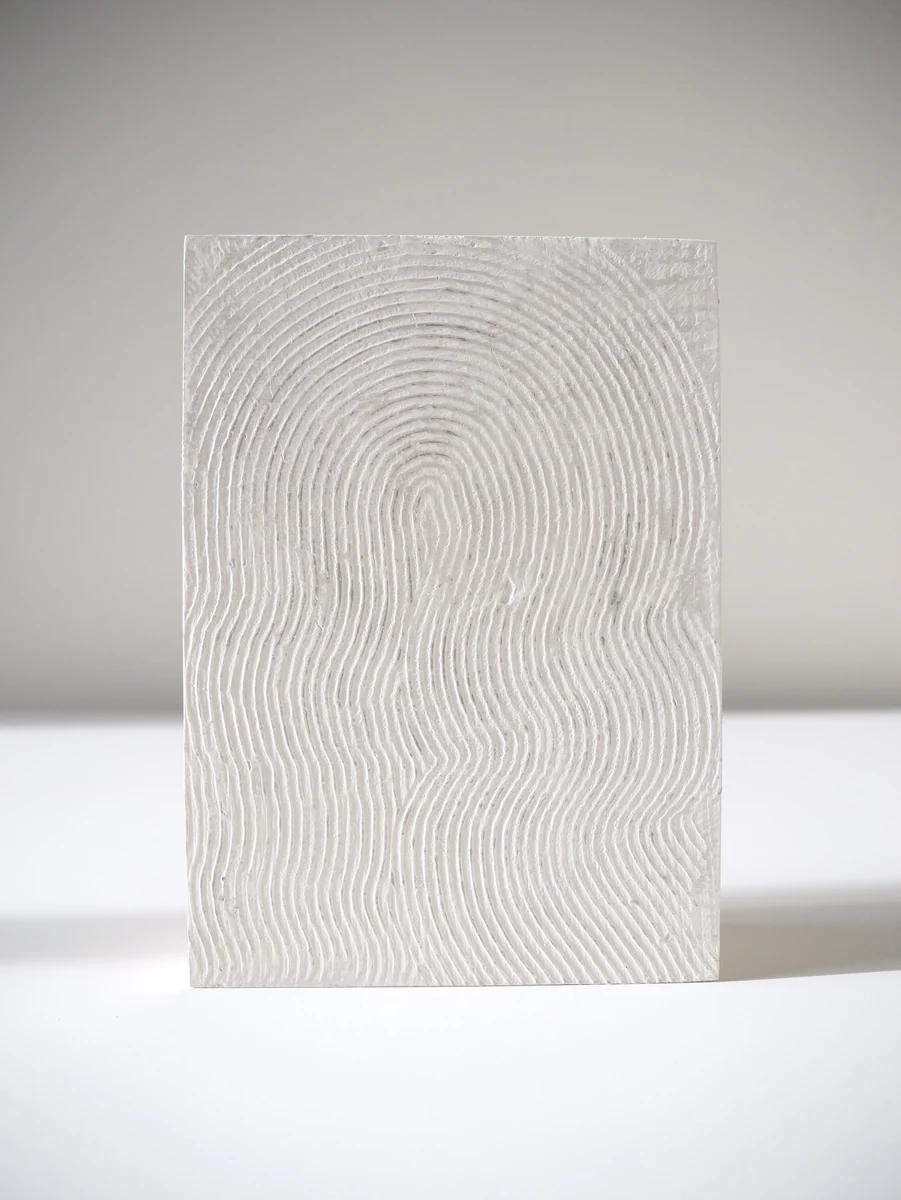 A single panel from the Passage series, a pale rectangular relief carved in fine concentric ridges like a fingerprint, mixed media on panel